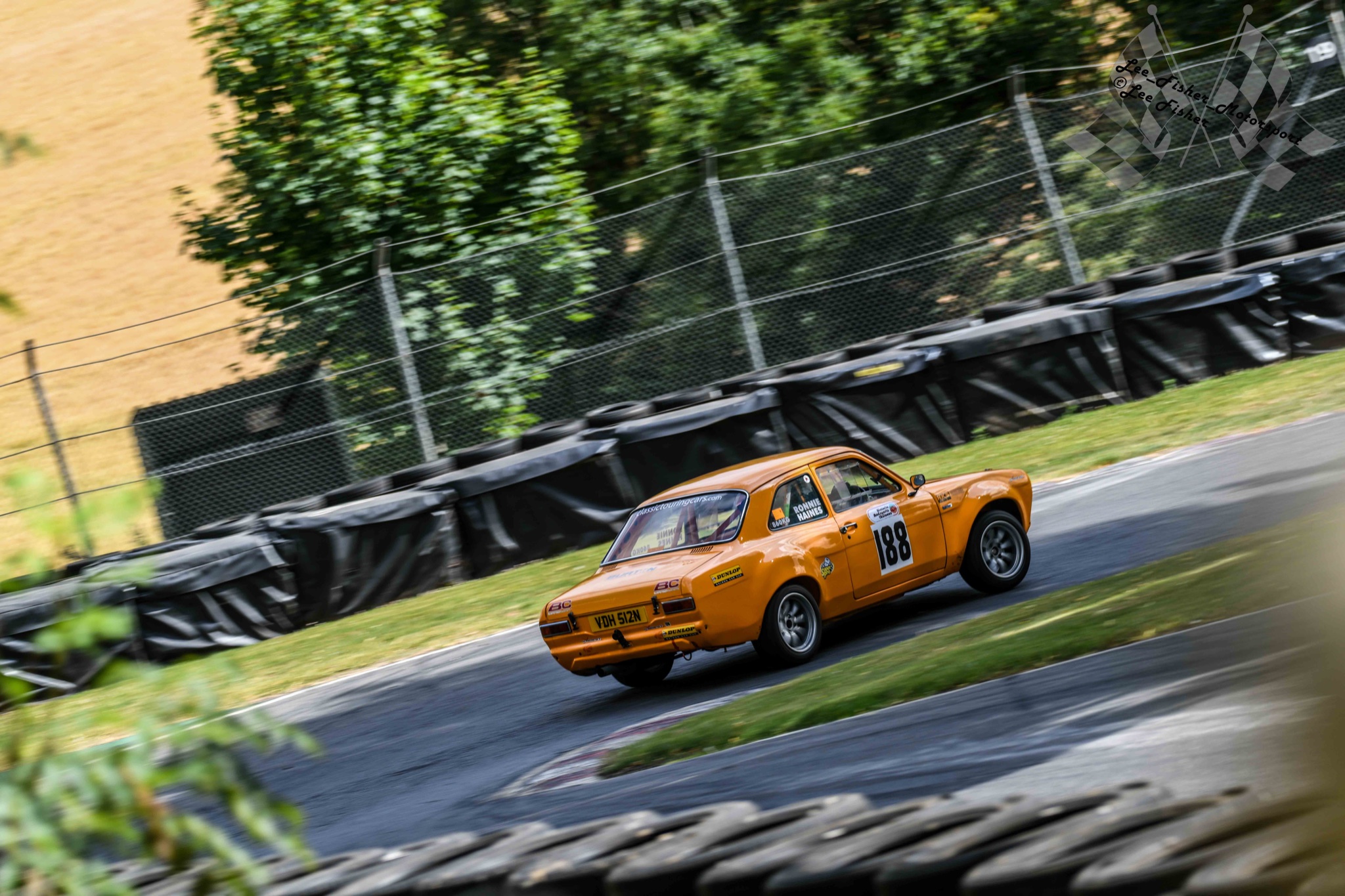 Beautiful image of a Mk1 Ford Escort on a track.